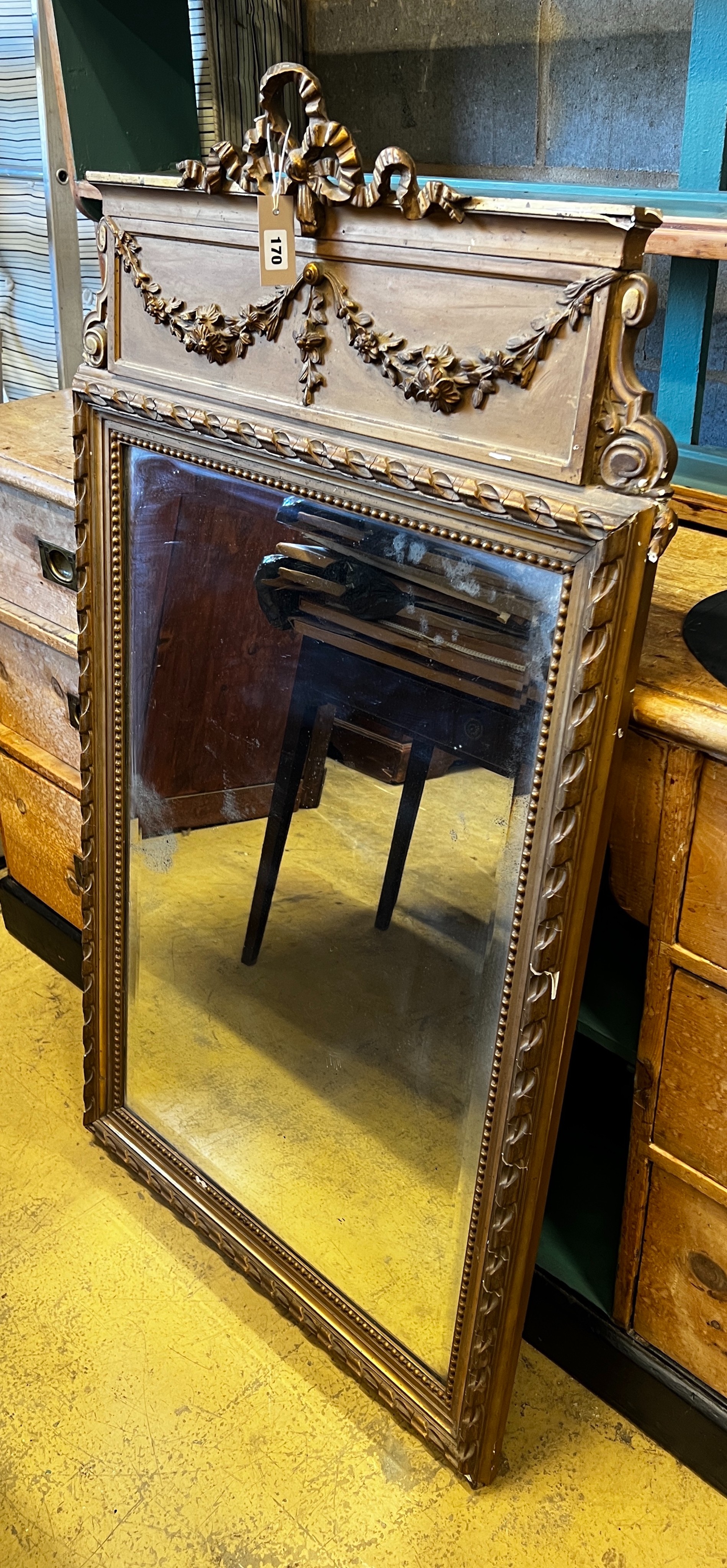 A late 19th century French giltwood and composition pier glass, width 75cm, height 134cm